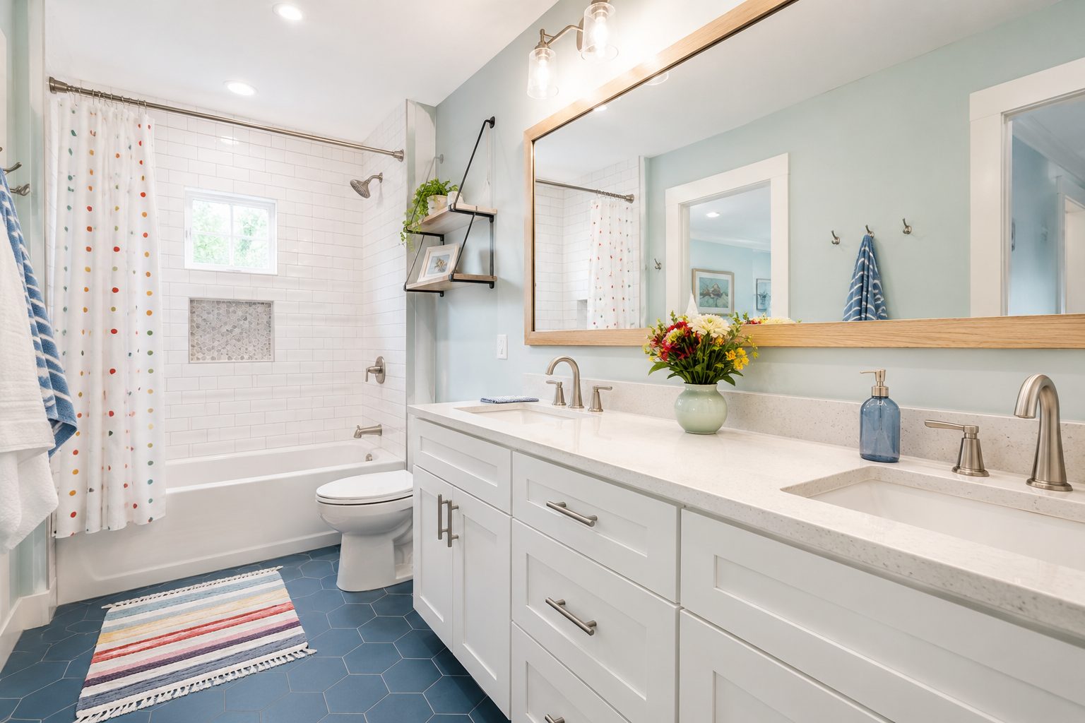 Family bathroom remodel with a tub-shower combo and a white double vanity